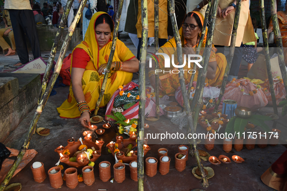 Hindu women devotees perform rituals during the Hindu festival Chhath in Kolkata, India, on November 7, 2024. The 'Chhath' festival is mostl...