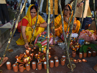 Hindu women devotees perform rituals during the Hindu festival Chhath in Kolkata, India, on November 7, 2024. The 'Chhath' festival is mostl...