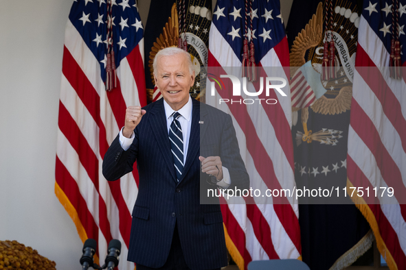 President Joe Biden pumps his fist after addressing senior staff and the nation on the results of the 2024 presidential election in the Whit...