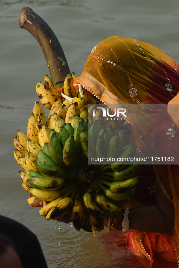 Hindu women devotees perform rituals during the Hindu festival Chhath in Kolkata, India, on November 7, 2024. The 'Chhath' festival is mostl...