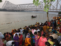 A Hindu devotee offers prayers to the sun god during The Chhath Festival at the Ganga ghat in Kolkata, India, on November 7, 2024. (