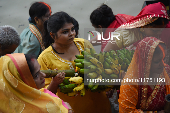 A Hindu devotee offers prayers to the sun god during The Chhath Festival at the Ganga ghat in Kolkata, India, on November 7, 2024. 