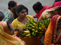 A Hindu devotee offers prayers to the sun god during The Chhath Festival at the Ganga ghat in Kolkata, India, on November 7, 2024. (