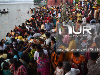 A Hindu devotee offers prayers to the sun god during The Chhath Festival at the Ganga ghat in Kolkata, India, on November 7, 2024. (