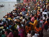 A Hindu devotee offers prayers to the sun god during The Chhath Festival at the Ganga ghat in Kolkata, India, on November 7, 2024. (