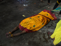 A Hindu devotee offers prayers to the sun god during The Chhath Festival at the Ganga ghat in Kolkata, India, on November 7, 2024. (