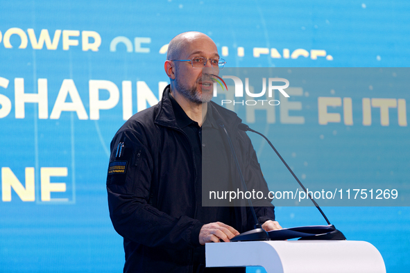 Prime Minister of Ukraine Denys Shmyhal delivers a speech during the opening of the Kyiv International Economic Forum in Kyiv, Ukraine, on N...