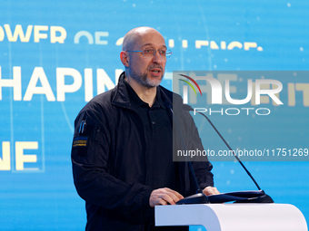 Prime Minister of Ukraine Denys Shmyhal delivers a speech during the opening of the Kyiv International Economic Forum in Kyiv, Ukraine, on N...