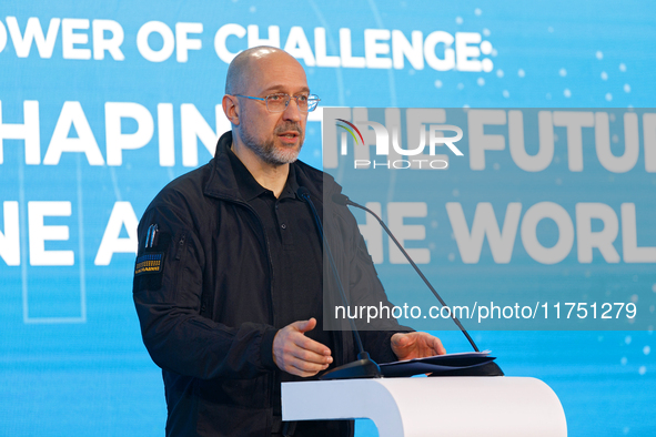 Prime Minister of Ukraine Denys Shmyhal delivers a speech during the opening of the Kyiv International Economic Forum in Kyiv, Ukraine, on N...