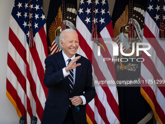 President Joe Biden waves to senior staff after addressing the nation on the results of the 2024 presidential election in the White House ro...