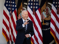 President Joe Biden waves to senior staff after addressing the nation on the results of the 2024 presidential election in the White House ro...