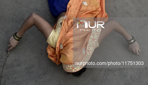 A Hindu devotee performs religious rituals near the Arabian Sea on the day of the Chhath Puja festival in Mumbai, India, on November 7, 2024...