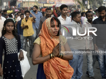 Hindu devotees perform religious rituals near the Arabian Sea on the day of the Chhath Puja festival in Mumbai, India, on November 7, 2024....