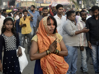 Hindu devotees perform religious rituals near the Arabian Sea on the day of the Chhath Puja festival in Mumbai, India, on November 7, 2024....