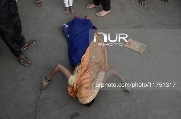 A Hindu devotee performs religious rituals near the Arabian Sea on the day of the Chhath Puja festival in Mumbai, India, on November 7, 2024...