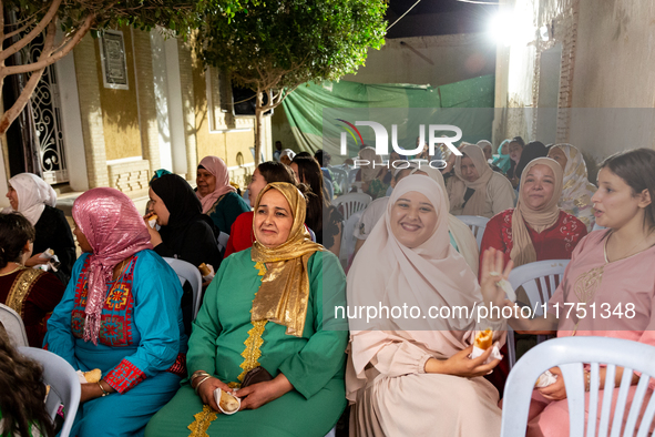 Bedouin wedding guests celebrate brite side of a wedding together with bride's family and friends in Tozeur, north west of Sahara, Tunisia o...