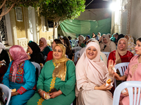 Bedouin wedding guests celebrate brite side of a wedding together with bride's family and friends in Tozeur, north west of Sahara, Tunisia o...