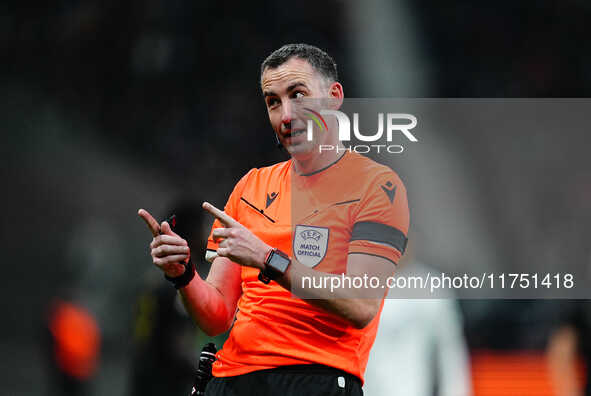 Chris Kavanagh, Referee from England,  gestures during the Eurepa League Round 4 match between Eintracht Frankfurt v SK Slavia Prague at the...