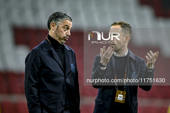 AFC Ajax Amsterdam assistant trainer Daniele Cavalletto and AFC Ajax Amsterdam physical trainer Callum Walsh are present during the match be...