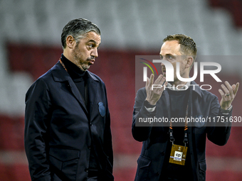 AFC Ajax Amsterdam assistant trainer Daniele Cavalletto and AFC Ajax Amsterdam physical trainer Callum Walsh are present during the match be...