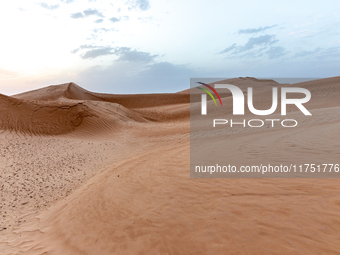 Dunes of Eastern Sahara desert are seen on a sunny day on October 30, 2024 near Douz, Tunisia. (