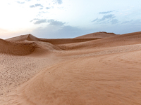 Dunes of Eastern Sahara desert are seen on a sunny day on October 30, 2024 near Douz, Tunisia. (