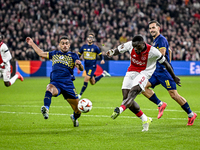 Maccabi Tel Aviv defender Raz Schlomo, AFC Ajax Amsterdam forward Brian Brobbey, and Maccabi Tel Aviv defender Nemanja Stojic participate in...