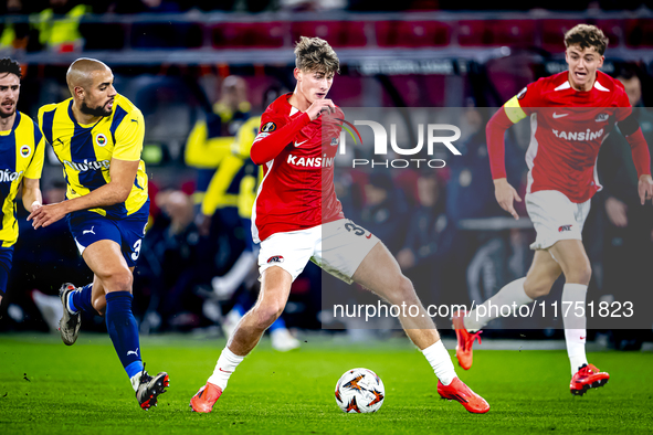 Fenerbahce midfielder Sofyan Amrabat and AZ Alkmaar midfielder Dave Kwakman play during the match between AZ and Fenerbahce at the AFAS Stad...