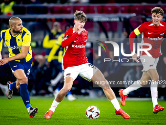 Fenerbahce midfielder Sofyan Amrabat and AZ Alkmaar midfielder Dave Kwakman play during the match between AZ and Fenerbahce at the AFAS Stad...