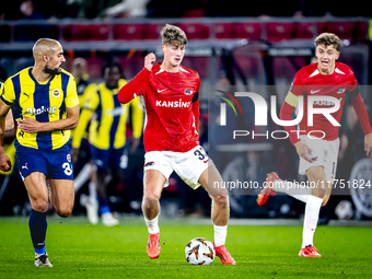 Fenerbahce midfielder Sofyan Amrabat and AZ Alkmaar midfielder Dave Kwakman play during the match between AZ and Fenerbahce at the AFAS Stad...