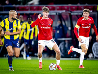 Fenerbahce midfielder Sofyan Amrabat and AZ Alkmaar midfielder Dave Kwakman play during the match between AZ and Fenerbahce at the AFAS Stad...