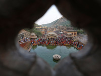 Hindu devotees perform rituals of the 'Chhath Puja' festival at the Shrine Galta Ji temple Kund in Jaipur, Rajasthan, India, on November 7,...