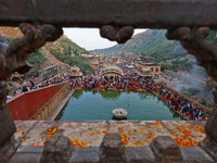 Hindu devotees perform rituals of the 'Chhath Puja' festival at the Shrine Galta Ji temple Kund in Jaipur, Rajasthan, India, on November 7,...