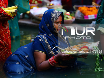 Hindu devotees perform rituals of the 'Chhath Puja' festival at the Shrine Galta Ji temple Kund in Jaipur, Rajasthan, India, on November 7,...