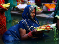 Hindu devotees perform rituals of the 'Chhath Puja' festival at the Shrine Galta Ji temple Kund in Jaipur, Rajasthan, India, on November 7,...