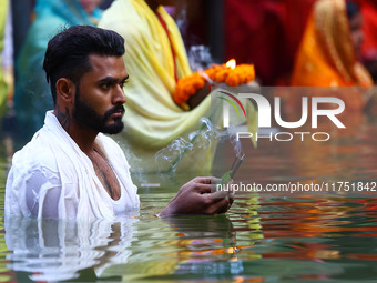 Hindu devotees perform rituals of the 'Chhath Puja' festival at the Shrine Galta Ji temple Kund in Jaipur, Rajasthan, India, on November 7,...