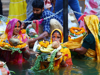 Hindu devotees perform rituals of the 'Chhath Puja' festival at the Shrine Galta Ji temple Kund in Jaipur, Rajasthan, India, on November 7,...