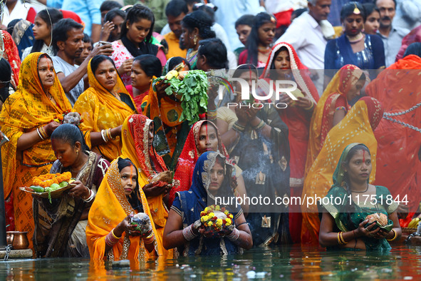 Hindu devotees perform rituals of the 'Chhath Puja' festival at the Shrine Galta Ji temple Kund in Jaipur, Rajasthan, India, on November 7,...