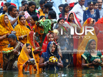 Hindu devotees perform rituals of the 'Chhath Puja' festival at the Shrine Galta Ji temple Kund in Jaipur, Rajasthan, India, on November 7,...