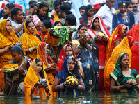 Hindu devotees perform rituals of the 'Chhath Puja' festival at the Shrine Galta Ji temple Kund in Jaipur, Rajasthan, India, on November 7,...