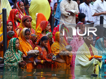 Hindu devotees perform rituals of the 'Chhath Puja' festival at the Shrine Galta Ji temple Kund in Jaipur, Rajasthan, India, on November 7,...