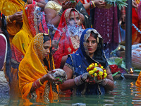 Hindu devotees perform rituals of the 'Chhath Puja' festival at the Shrine Galta Ji temple Kund in Jaipur, Rajasthan, India, on November 7,...