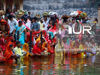 Hindu devotees perform rituals of the 'Chhath Puja' festival at the Shrine Galta Ji temple Kund in Jaipur, Rajasthan, India, on November 7,...