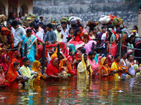 Hindu devotees perform rituals of the 'Chhath Puja' festival at the Shrine Galta Ji temple Kund in Jaipur, Rajasthan, India, on November 7,...