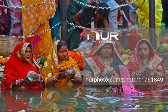 Hindu devotees perform rituals of the 'Chhath Puja' festival at the Shrine Galta Ji temple Kund in Jaipur, Rajasthan, India, on November 7,...