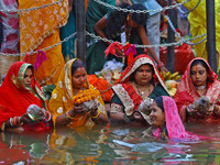 Hindu devotees perform rituals of the 'Chhath Puja' festival at the Shrine Galta Ji temple Kund in Jaipur, Rajasthan, India, on November 7,...