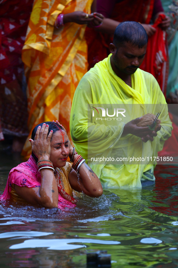 Hindu devotees perform rituals of the 'Chhath Puja' festival at the Shrine Galta Ji temple Kund in Jaipur, Rajasthan, India, on November 7,...