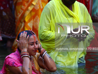 Hindu devotees perform rituals of the 'Chhath Puja' festival at the Shrine Galta Ji temple Kund in Jaipur, Rajasthan, India, on November 7,...