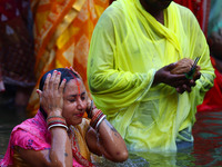 Hindu devotees perform rituals of the 'Chhath Puja' festival at the Shrine Galta Ji temple Kund in Jaipur, Rajasthan, India, on November 7,...