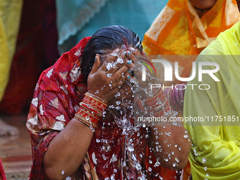 Hindu devotees perform rituals of the 'Chhath Puja' festival at the Shrine Galta Ji temple Kund in Jaipur, Rajasthan, India, on November 7,...